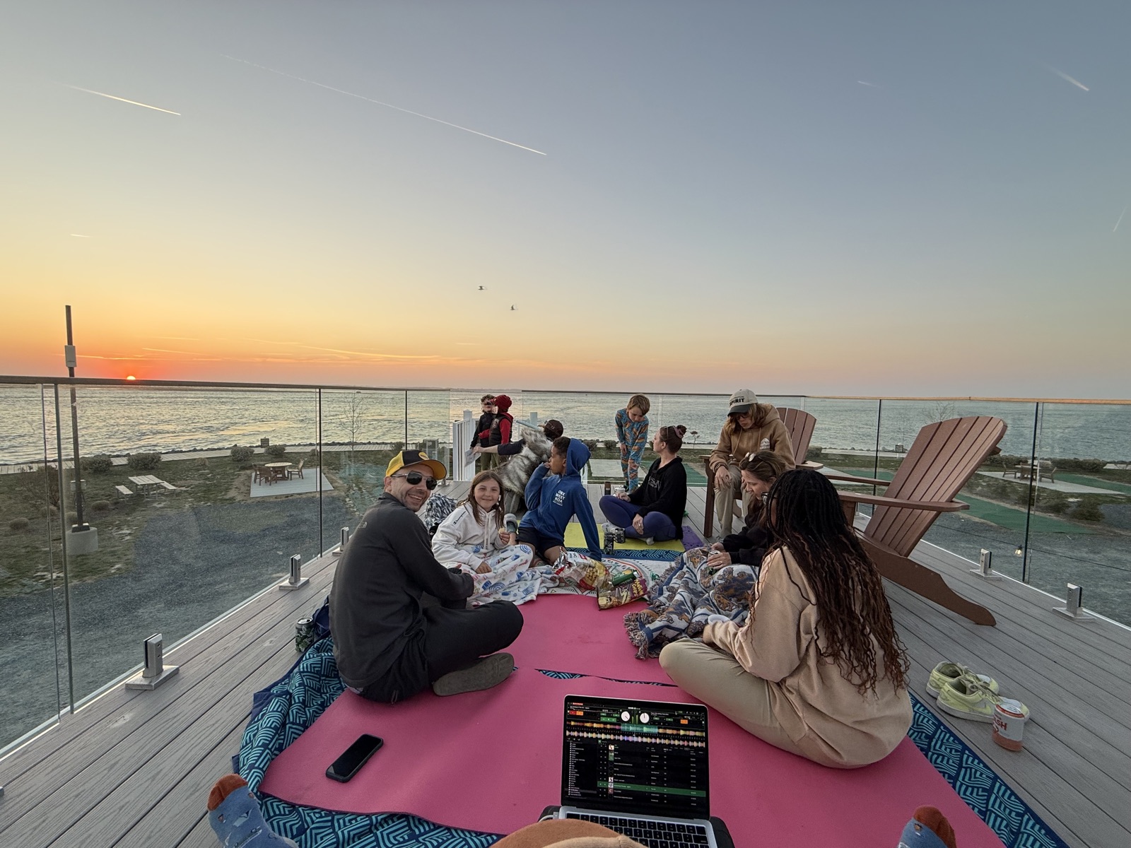 Sunset rooftop gathering with the DJ